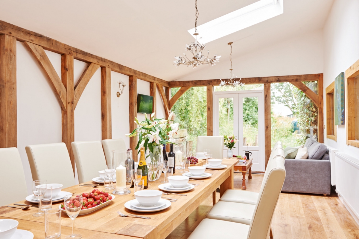 Oak table seating 18 in the dining area